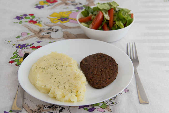 Vegetarian Steak, mash potatoes and salad